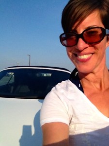 See how happy I look leaning on her hood?