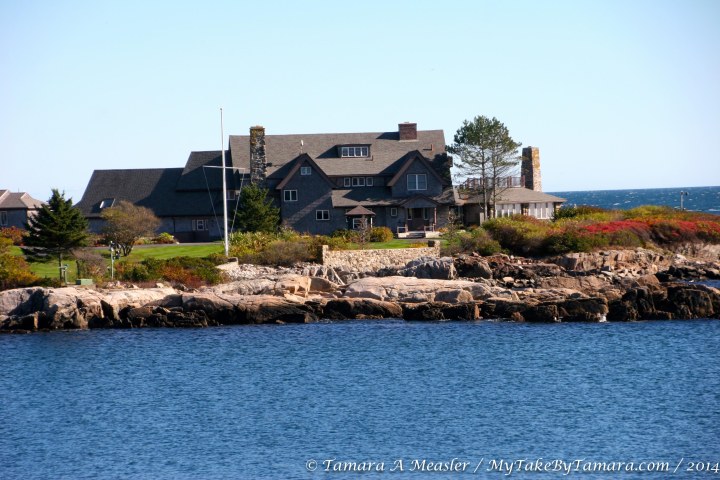 The Bush house (one of at least six on the compound) with a splash of red color